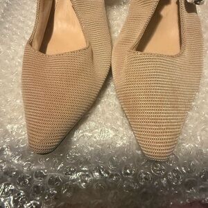 Dior Tan Heels with Elegant Slingback Style . They fit like a size 8.5 .